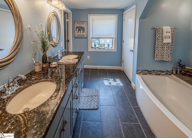 849 Harvey Rd, Greer, SC 29651 - bathroom featuring double vanity and a bath