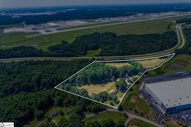 849 Harvey Rd, Greer, SC 29651 - aerial view of property and surrounding area with property boundaries highlighted and a forest