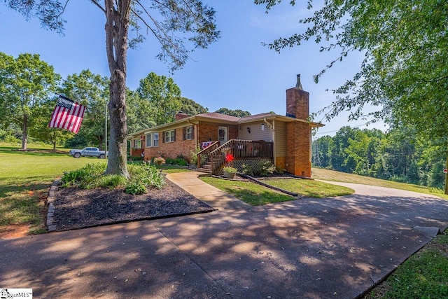 849 Harvey Rd, Greer, SC 29651 - single story home with a chimney, brick siding, and a front lawn