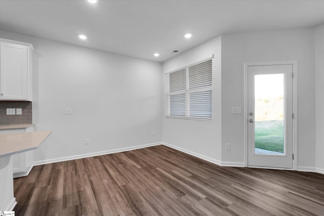 292 E Compass Way, Easley, SC 29640 - unfurnished dining area with dark wood-style flooring and recessed lighting