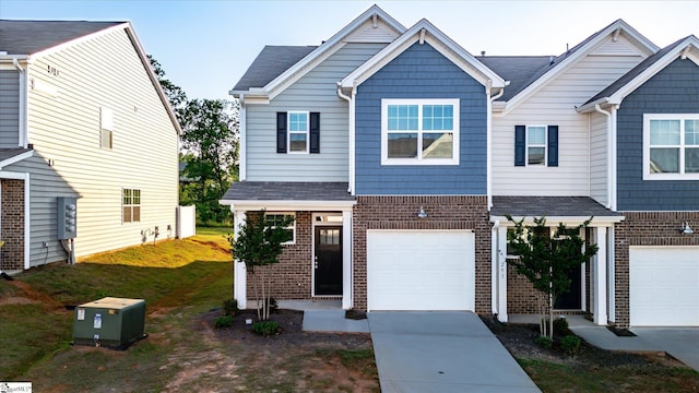 291 E Compass Way, Easley, SC 29640 - view of front of property with brick siding, concrete driveway, a garage, and a front yard