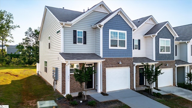 291 E Compass Way, Easley, SC 29640 - multi unit property featuring brick siding, concrete driveway, an attached garage, and a front yard