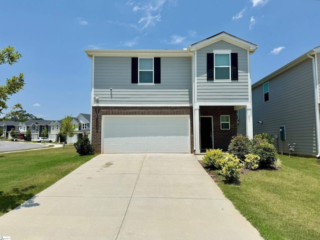 203 Lanyard Ln, Greenville, SC 29607 - view of front of house with brick siding, a front lawn, driveway, and a garage
