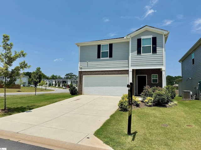 203 Lanyard Ln, Greenville, SC 29607 - view of front of property with brick siding, an attached garage, concrete driveway, and a front lawn