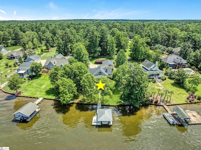 224 Seabright Cir, Cross Hill, SC 29332 - aerial perspective of suburban area featuring a heavily wooded area and a large body of water