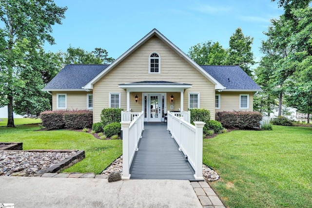 224 Seabright Cir, Cross Hill, SC 29332 - bungalow with a shingled roof, a front lawn, and french doors