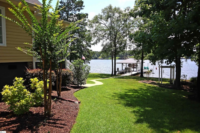 224 Seabright Cir, Cross Hill, SC 29332 - view of grassy yard featuring a water view, boat lift, and a dock