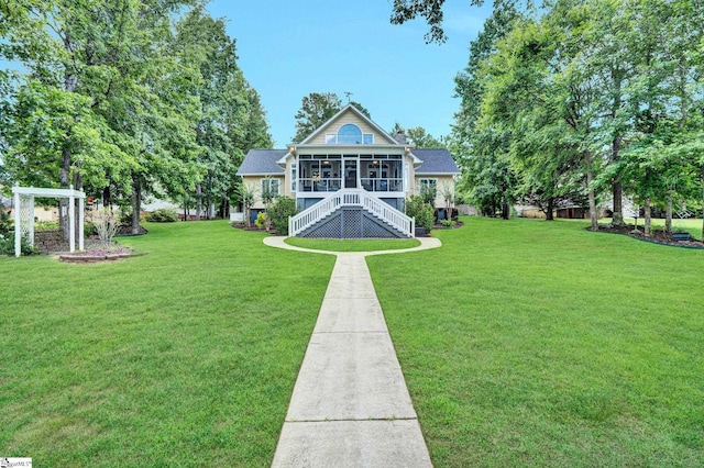 224 Seabright Cir, Cross Hill, SC 29332 - rear view of property with a sunroom, stairway, and a lawn