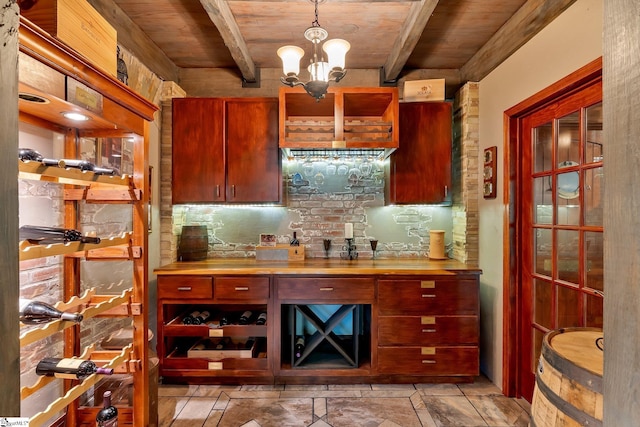 24 Lighthouse Way Dr, Salem, SC 29676 - kitchen with a wood ceiling with exposed beams, a chandelier, decorative light fixtures, stone tile flooring, and light countertops