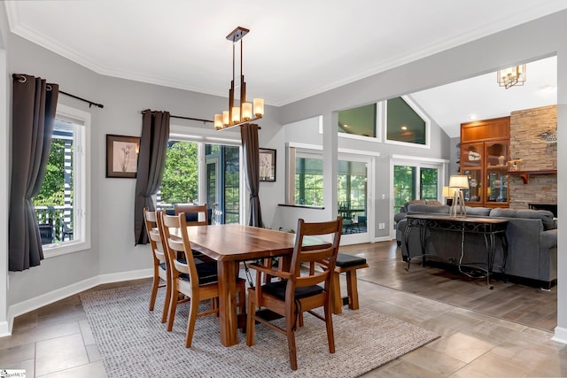 24 Lighthouse Way Dr, Salem, SC 29676 - dining room with a chandelier, crown molding, and a fireplace