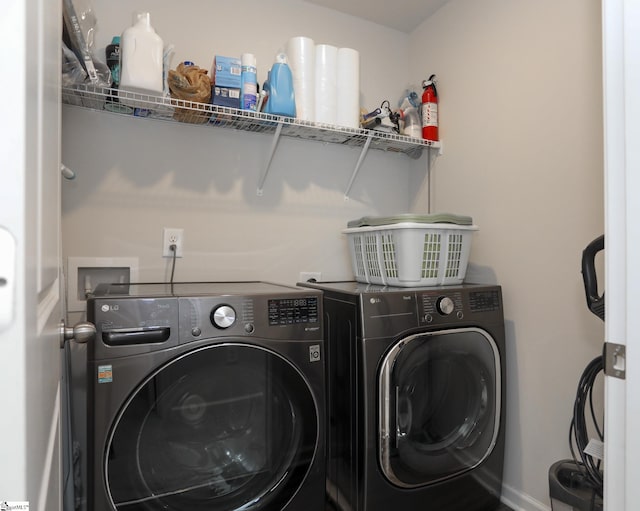 228 Anna Gray Cir, Easley, SC 29640 - laundry room with separate washer and dryer and baseboards