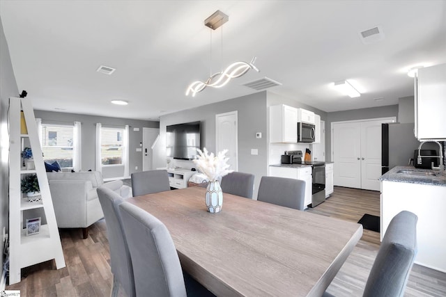 209 Long Grove Ln, Greer, SC 29650 - dining area with wood finished floors