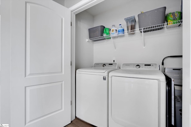 209 Long Grove Ln, Greer, SC 29650 - washroom with washer and clothes dryer and wood finished floors