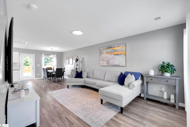 209 Long Grove Ln, Greer, SC 29650 - living room with light wood-style flooring and baseboards