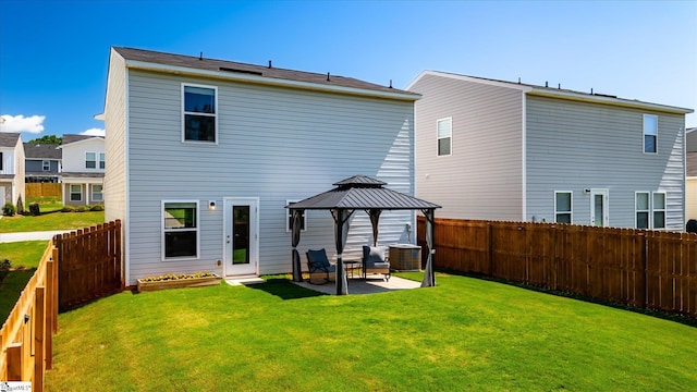 209 Long Grove Ln, Greer, SC 29650 - rear view of house featuring a gazebo, a patio area, and a fenced backyard