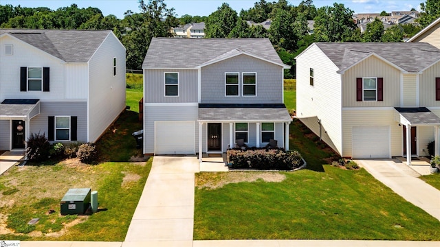 209 Long Grove Ln, Greer, SC 29650 - traditional-style home with a garage, concrete driveway, and a front lawn