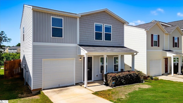 209 Long Grove Ln, Greer, SC 29650 - view of front of property featuring a garage, covered porch, a front lawn, driveway, and a shingled roof