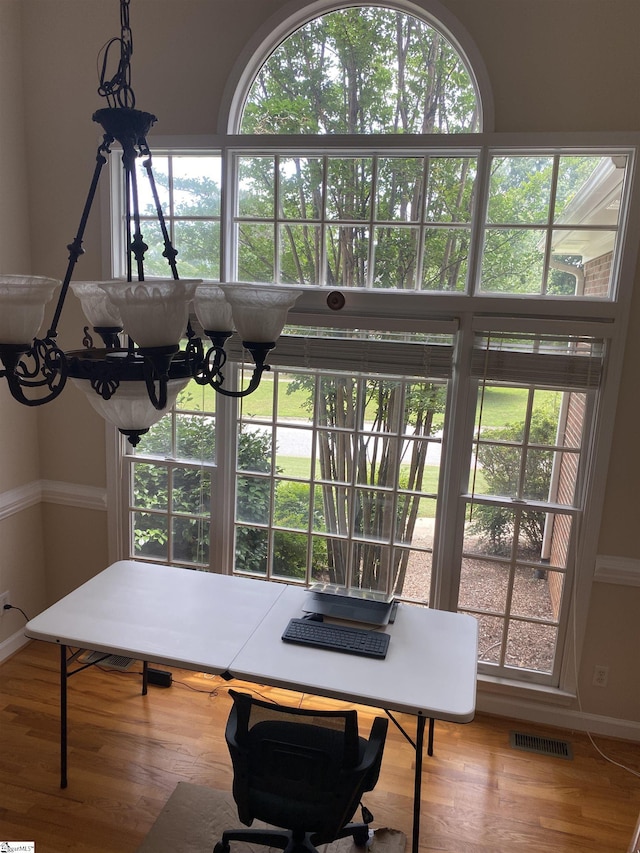 523 Meadowsweet Ln, Greenville, SC 29615 - office area with a chandelier and wood finished floors