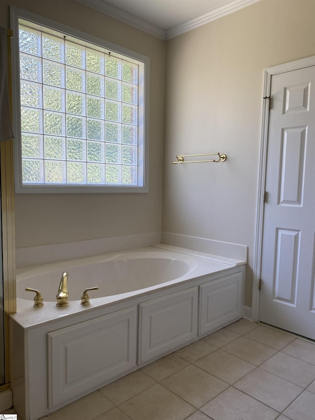 523 Meadowsweet Ln, Greenville, SC 29615 - bathroom with a garden tub, tile patterned flooring, and crown molding