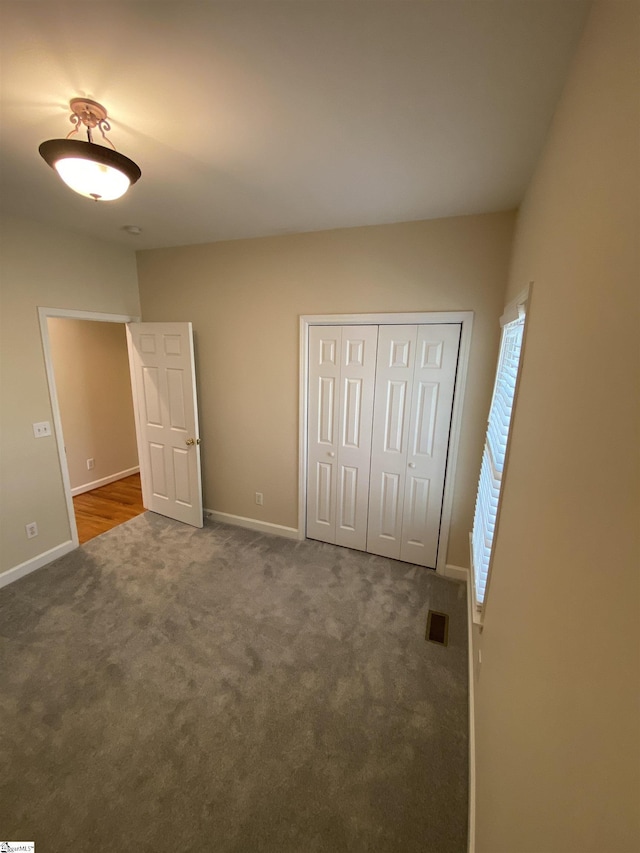 523 Meadowsweet Ln, Greenville, SC 29615 - unfurnished bedroom featuring carpet floors and a closet