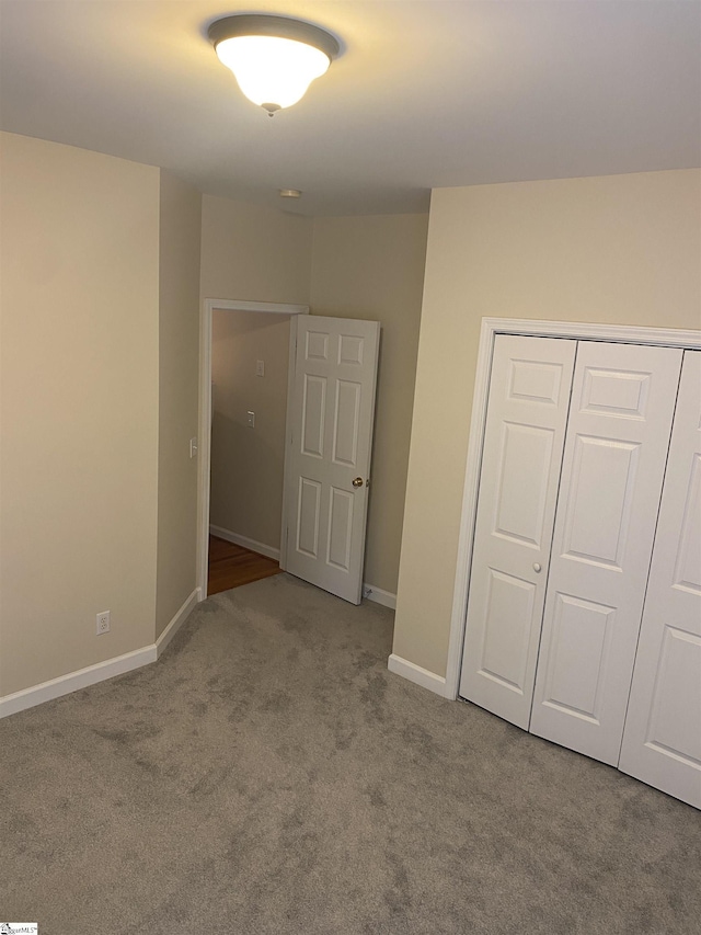 523 Meadowsweet Ln, Greenville, SC 29615 - unfurnished bedroom with carpet flooring and a closet