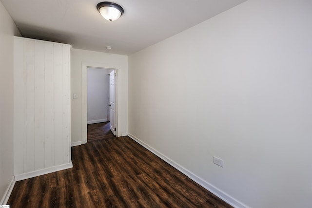 24 Burts St, Pelzer, SC 29669 - spare room with dark wood-style flooring and baseboards