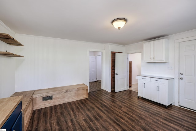24 Burts St, Pelzer, SC 29669 - kitchen featuring white cabinets, dark wood-type flooring, light countertops, open shelves, and ornamental molding