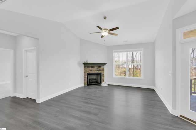 285 Foxbank Cir, Greer, SC 29651 - unfurnished living room with lofted ceiling, ceiling fan, dark wood-style flooring, healthy amount of natural light, and a stone fireplace