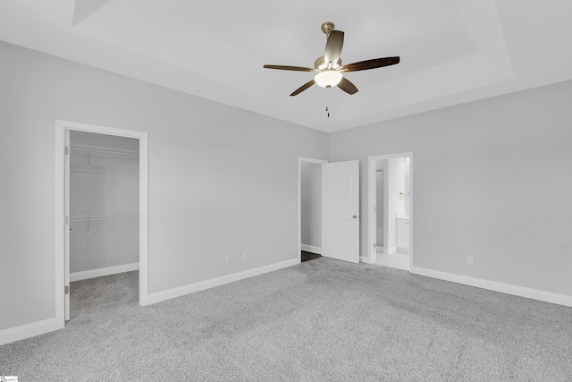 285 Foxbank Cir, Greer, SC 29651 - unfurnished bedroom with carpet, a walk in closet, a closet, connected bathroom, and a ceiling fan