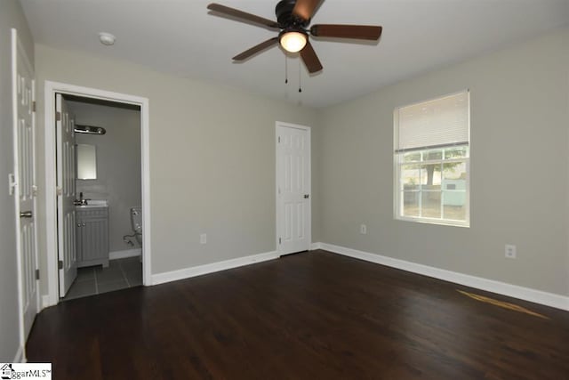 109 Mountain View Ave, Greer, SC 29650 - unfurnished bedroom with wood finished floors, ensuite bath, and ceiling fan