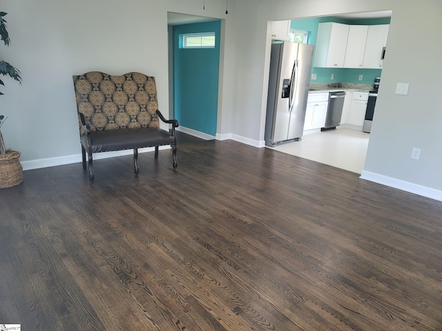109 Mountain View Ave, Greer, SC 29650 - sitting room with dark wood-type flooring and baseboards