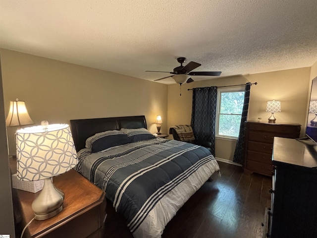 404 Frostbery Ct, Fountain Inn, SC 29644 - bedroom featuring dark wood finished floors, a ceiling fan, and a textured ceiling