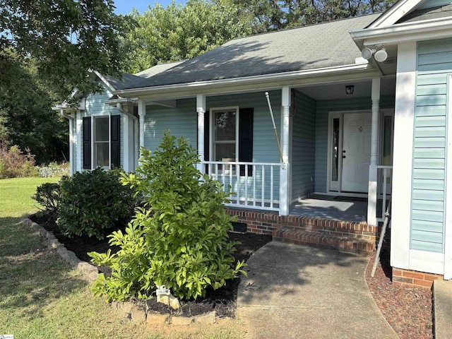404 Frostbery Ct, Fountain Inn, SC 29644 - property entrance featuring covered porch and a shingled roof