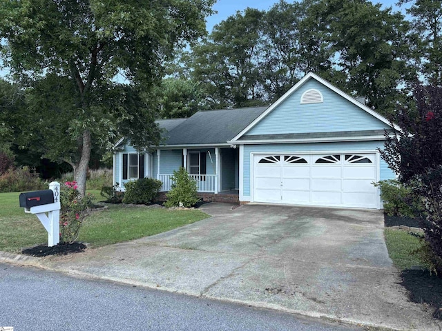 404 Frostbery Ct, Fountain Inn, SC 29644 - ranch-style home featuring a porch, a garage, concrete driveway, a front yard, and roof with shingles