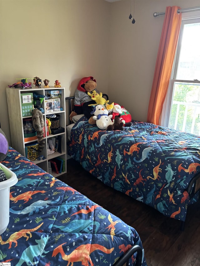 404 Frostbery Ct, Fountain Inn, SC 29644 - bedroom with wood finished floors and multiple windows
