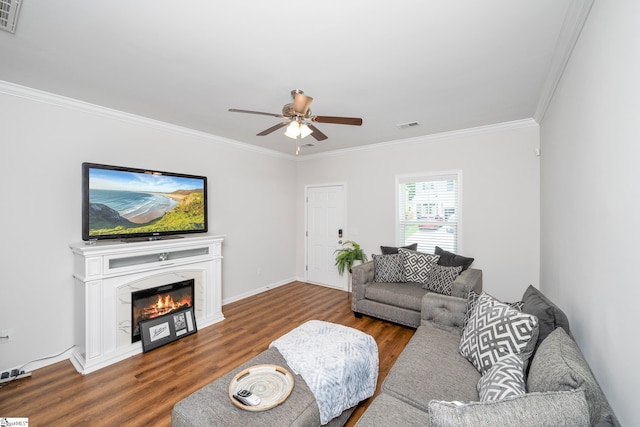 131 Highland Park Ct, Easley, SC 29642 - living room featuring crown molding, wood finished floors, a ceiling fan, and a premium fireplace