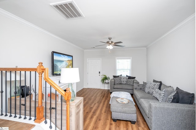 131 Highland Park Ct, Easley, SC 29642 - living room with ornamental molding, wood finished floors, and ceiling fan