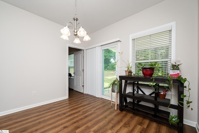 131 Highland Park Ct, Easley, SC 29642 - dining space featuring a chandelier and dark wood-style flooring