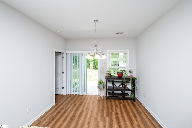 131 Highland Park Ct, Easley, SC 29642 - dining room with a chandelier and wood finished floors
