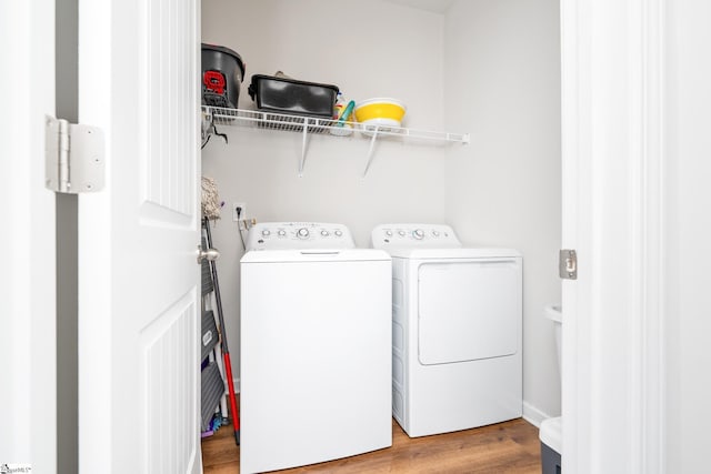 131 Highland Park Ct, Easley, SC 29642 - laundry room featuring washing machine and dryer and light wood-type flooring