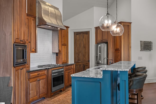 337 Knox Campground Rd, Seneca, SC 29672 - kitchen featuring stainless steel appliances, extractor fan, tasteful backsplash, a chandelier, and brown cabinetry