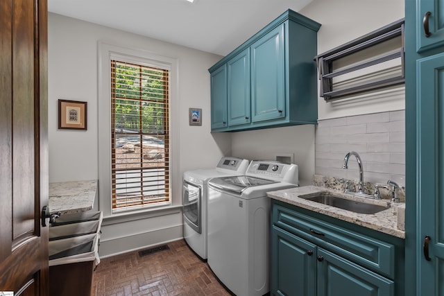 337 Knox Campground Rd, Seneca, SC 29672 - laundry room featuring cabinet space, independent washer and dryer, and brick patterned flooring