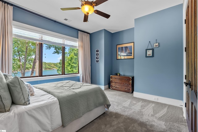 337 Knox Campground Rd, Seneca, SC 29672 - bedroom featuring light carpet, ceiling fan, and a water view