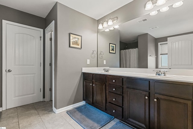 505 Jones Peak Dr, Simpsonville, SC 29681 - bathroom featuring double vanity and tile patterned flooring