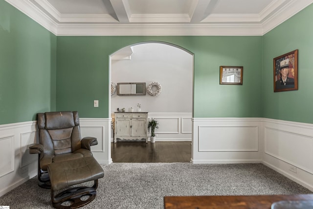 505 Jones Peak Dr, Simpsonville, SC 29681 - sitting room with ornamental molding, a wainscoted wall, arched walkways, a decorative wall, and beamed ceiling