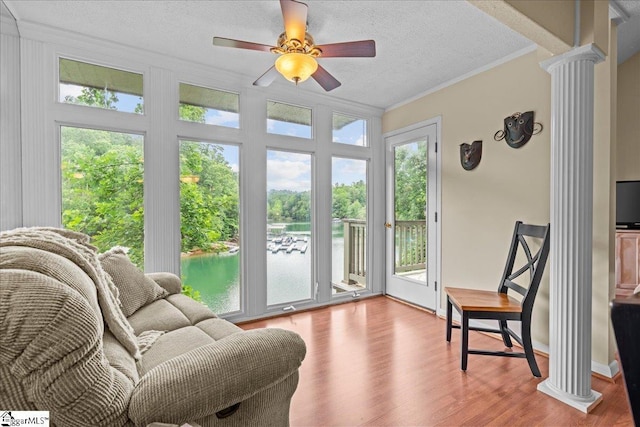 701 Loran Pointe Pointe, Seneca, SC 29672 - living area with ornamental molding, ornate columns, a textured ceiling, wood finished floors, and ceiling fan