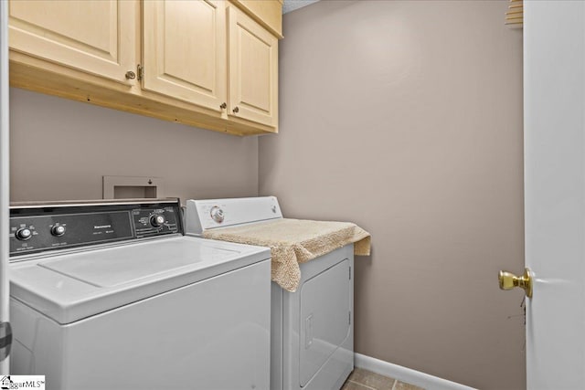 701 Loran Pointe Pointe, Seneca, SC 29672 - laundry room featuring separate washer and dryer, cabinet space, and tile patterned floors