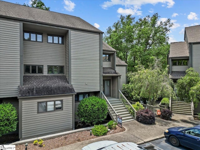 701 Loran Pointe Pointe, Seneca, SC 29672 - view of building exterior with stairs and uncovered parking