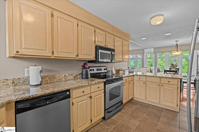701 Loran Pointe Pointe, Seneca, SC 29672 - kitchen with stainless steel appliances, light brown cabinetry, a peninsula, a textured ceiling, and light stone countertops