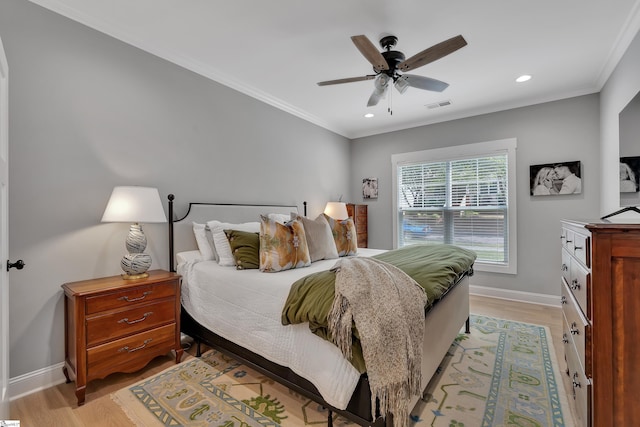 209 Pinckney St, Greenville, SC 29601 - bedroom with light wood-style floors, crown molding, recessed lighting, and a ceiling fan